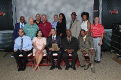 McKinney with family, friends and colleagues following his induction into the Illinois Basketball Coaches Association (IBCA) Hall of Fame in 2021 at Illinois State University.